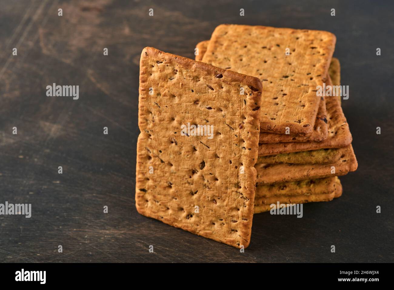 Cracker with flax seeds and oat bran rectangular shape for healthy, dietary and balanced diet on