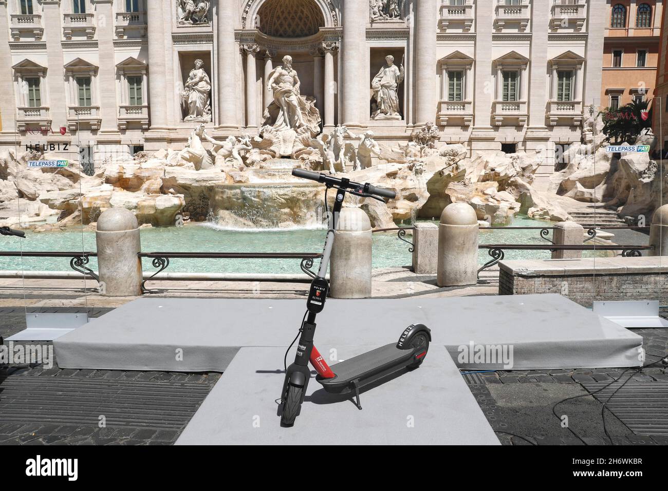 Italy, Rome, May 28, 2020 : Presentation of the new scooter service in sharing, during phase 2 contrast to coronavirus (COVID-19), at Trevi Fountain. Stock Photo