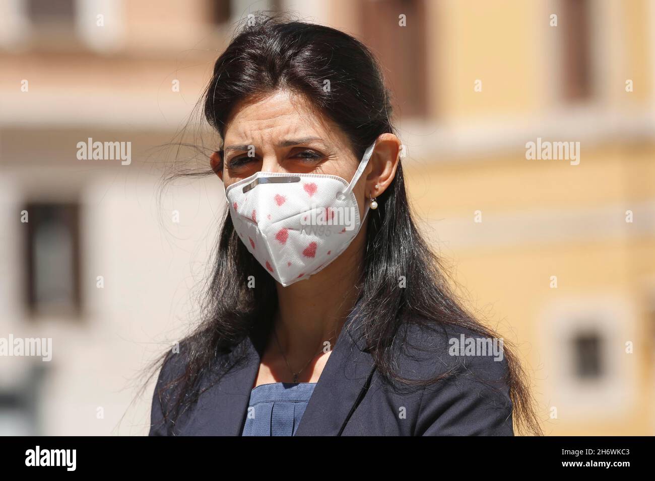 Italy, Rome, May 28, 2020 : Rome Mayor Virginia Raggi, wearing a safety mask, presents the new scooter service in sharing, during phase 2 contrast to Stock Photo