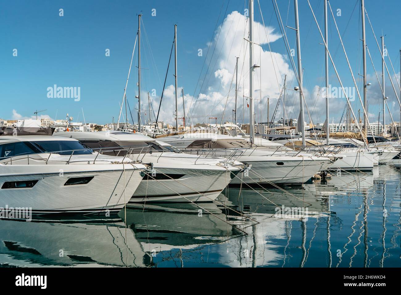 Luxury boats and yachts in harbor. Sunny summer day.Holiday high class lifestyle travel concept.Boat trip in Mediterranean.View of expensive sailing y Stock Photo