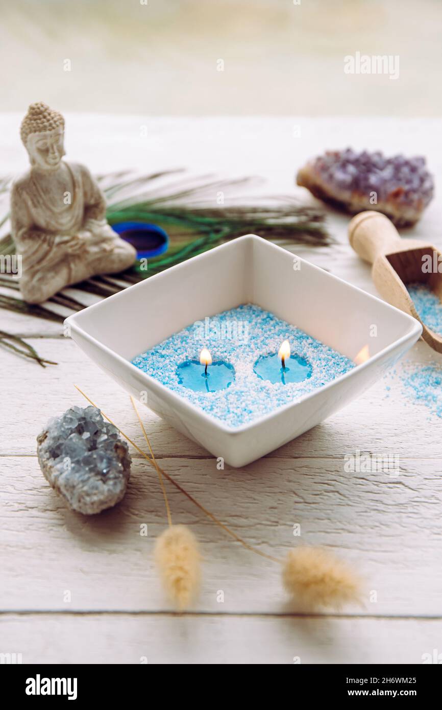 Blue and white granulated wax crystals to create candles by