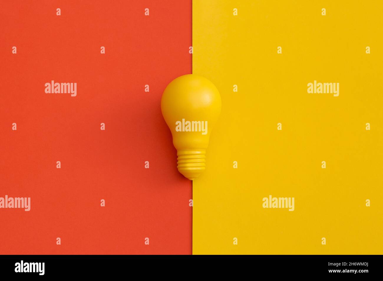 Light bulb on color background. Inspiration and creative idea concept. Top view with copy space. Flat lay composition. Stock Photo