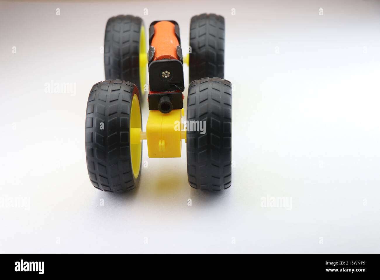 Working model small scale electric car made by Dual shaft dc motor and big wheels, Stem projects for creative engineer Stock Photo