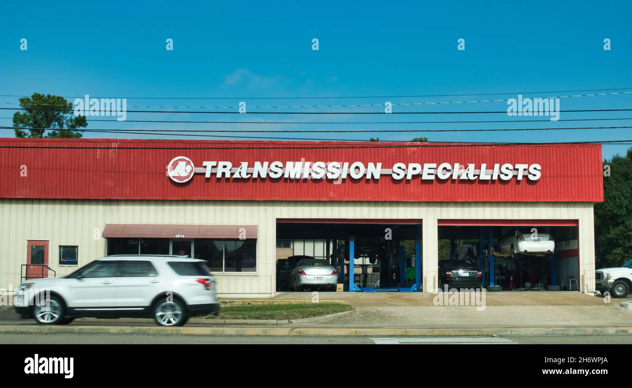 Houston, Texas USA 11-12-2021: A-plus Transmission Specialists building exterior in Houston, TX. Automotive repair chain located in Texas. Stock Photo