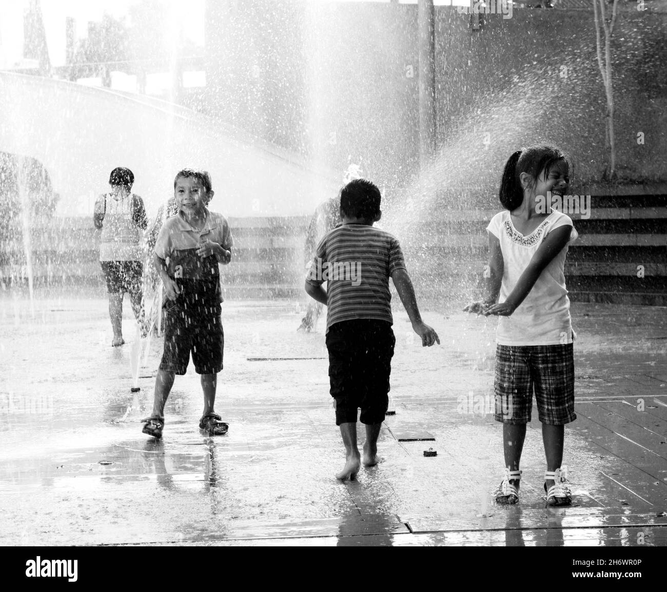 Children play in the fountains Black and White Stock Photos Images Alamy