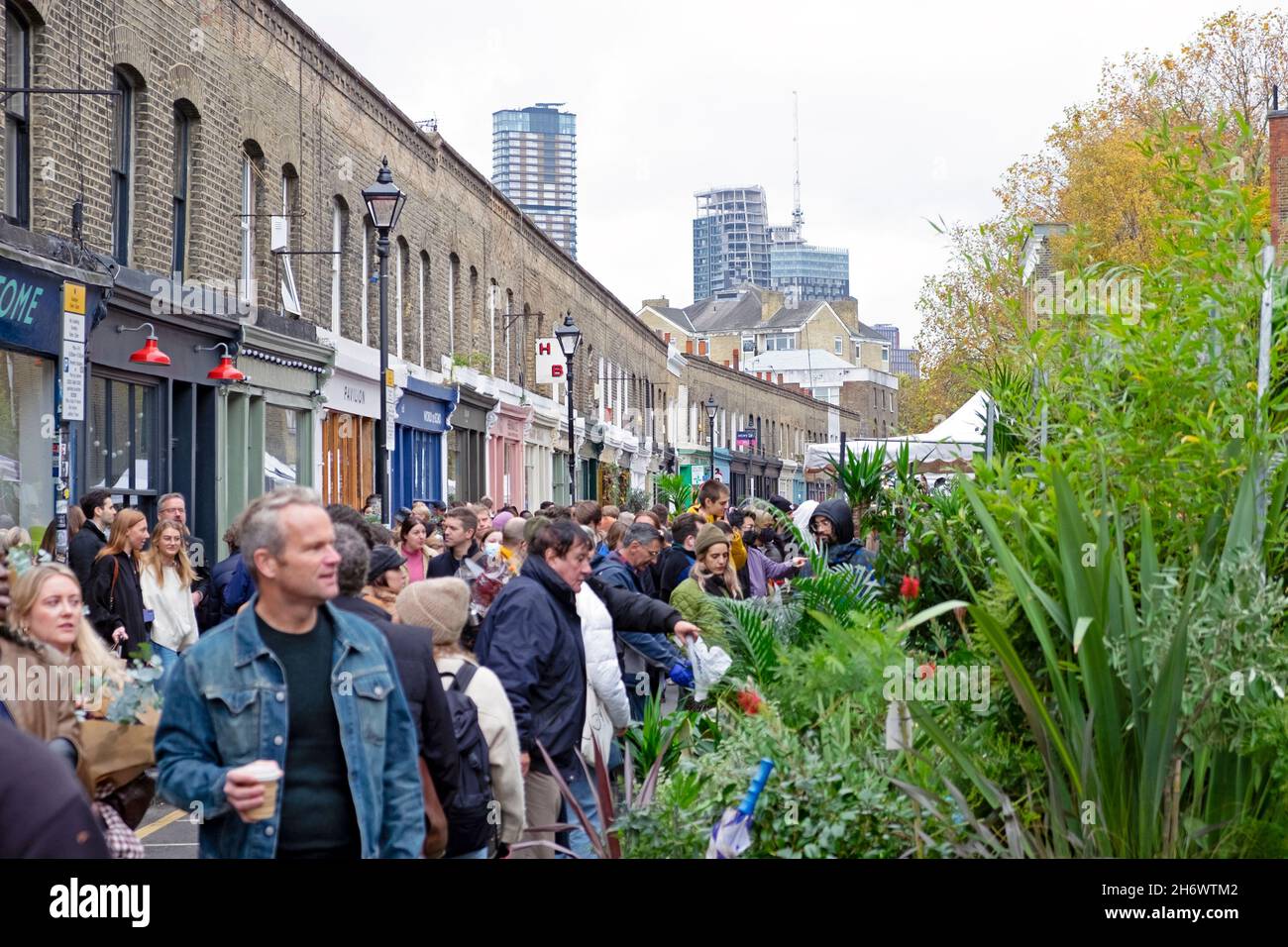 Columbia Road Flower Market people buying plants flowers in the street