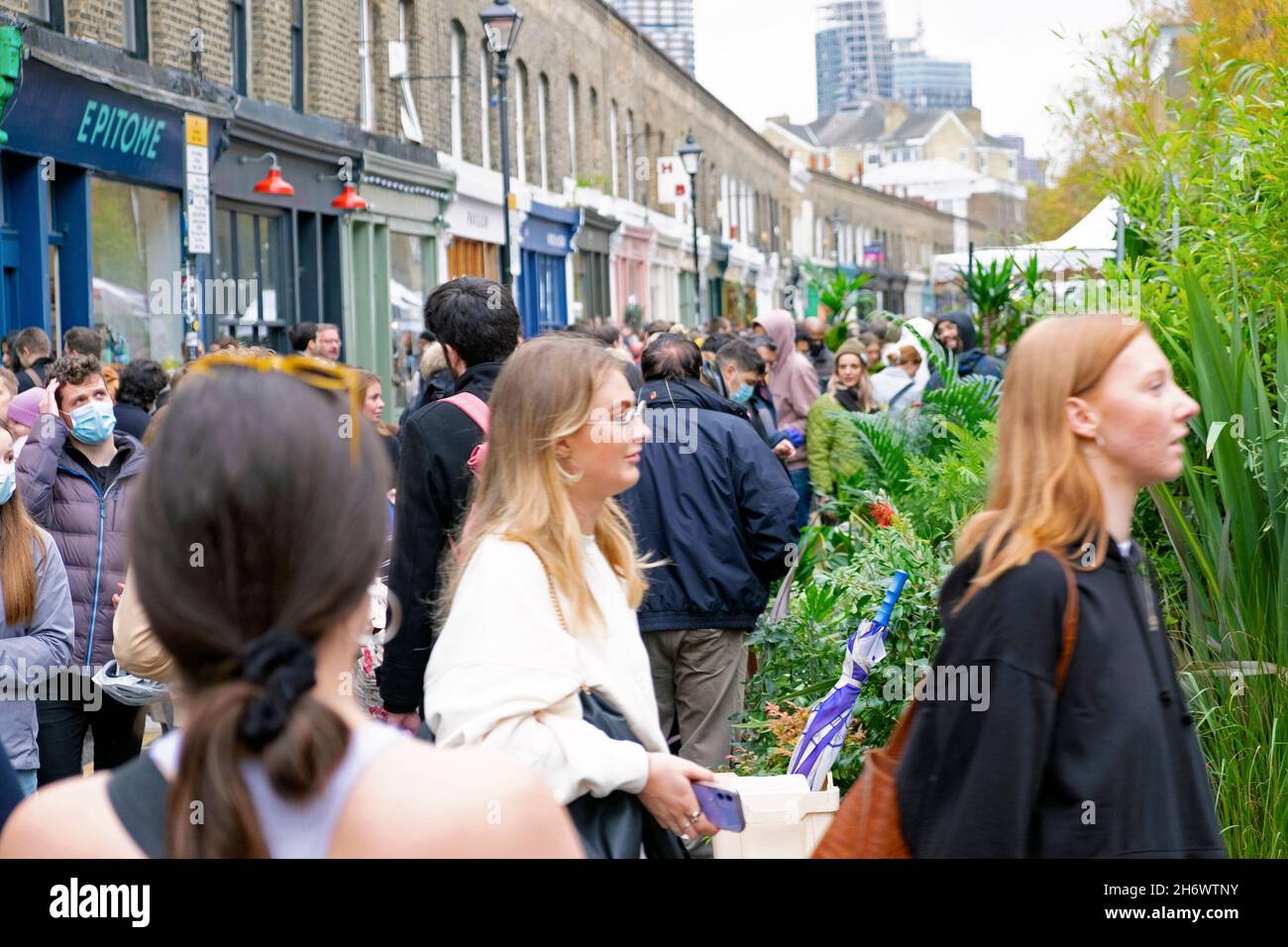 Columbia Road Flower Market people buying plants flowers in the street