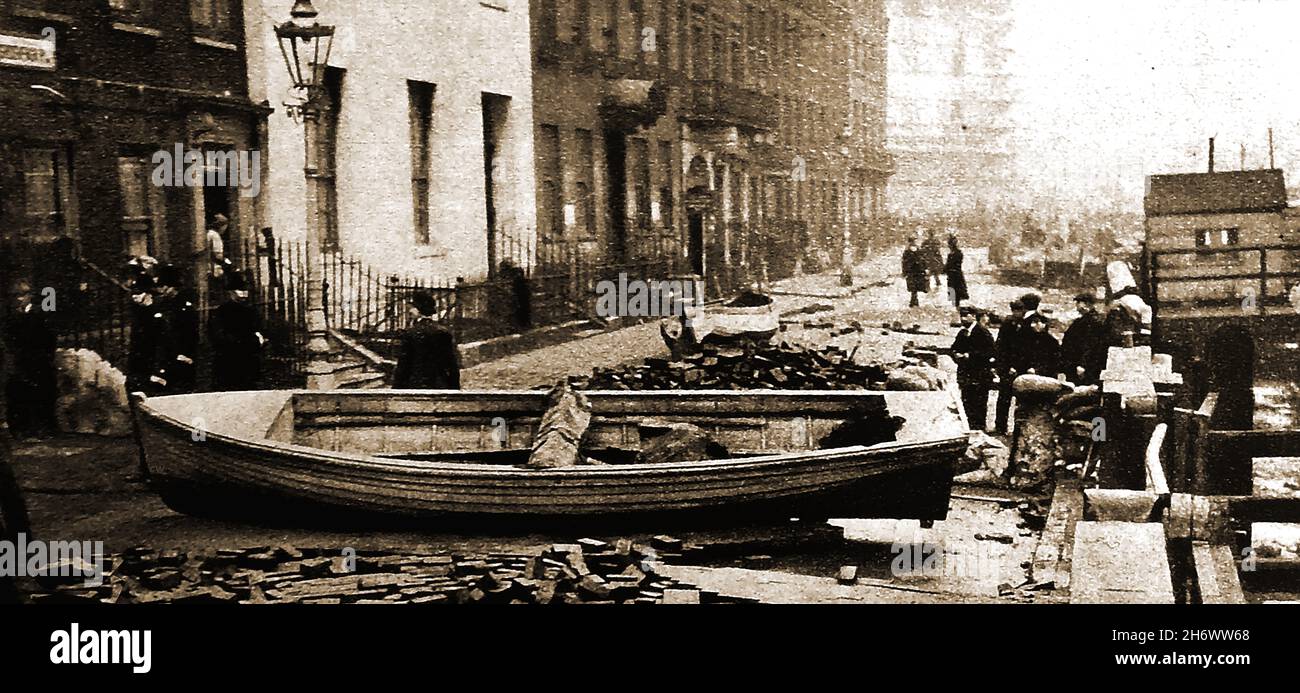 A scene from the London floods (UK) in 1929   -- A boat washed into Grosvenor Road  after 18 days of continuous rain fell. Stock Photo
