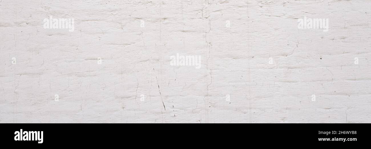 White brick wall background. Simple grungy white brick wall as seamless pattern texture background. Stock Photo