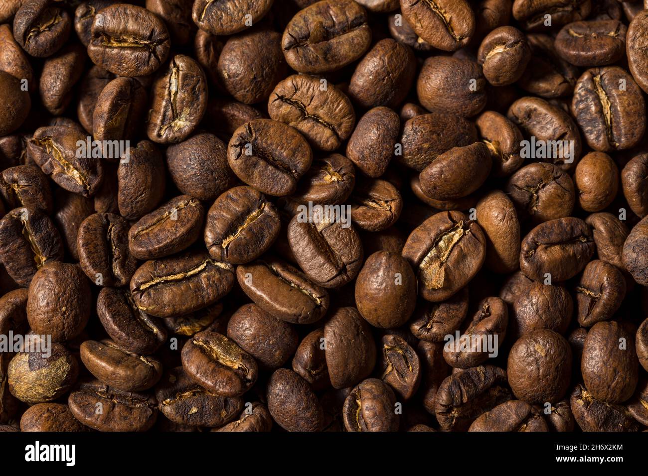 Raw Organic Roasted Espresso Coffee Beans in a Bowl Stock Photo