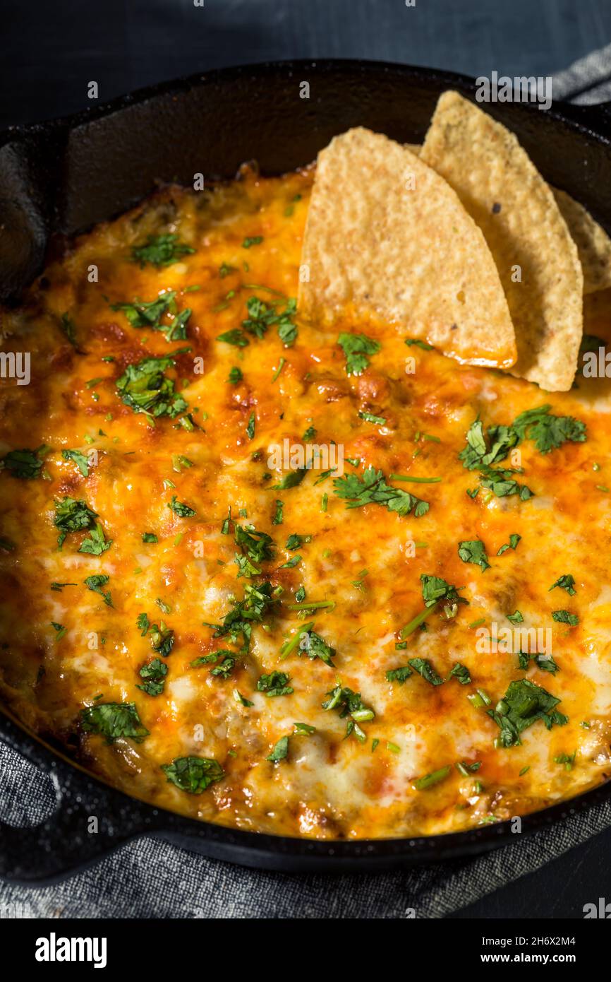 Homemade Mexican Chorizo Queso Oaxaca Dip with Tortilla Chips Stock