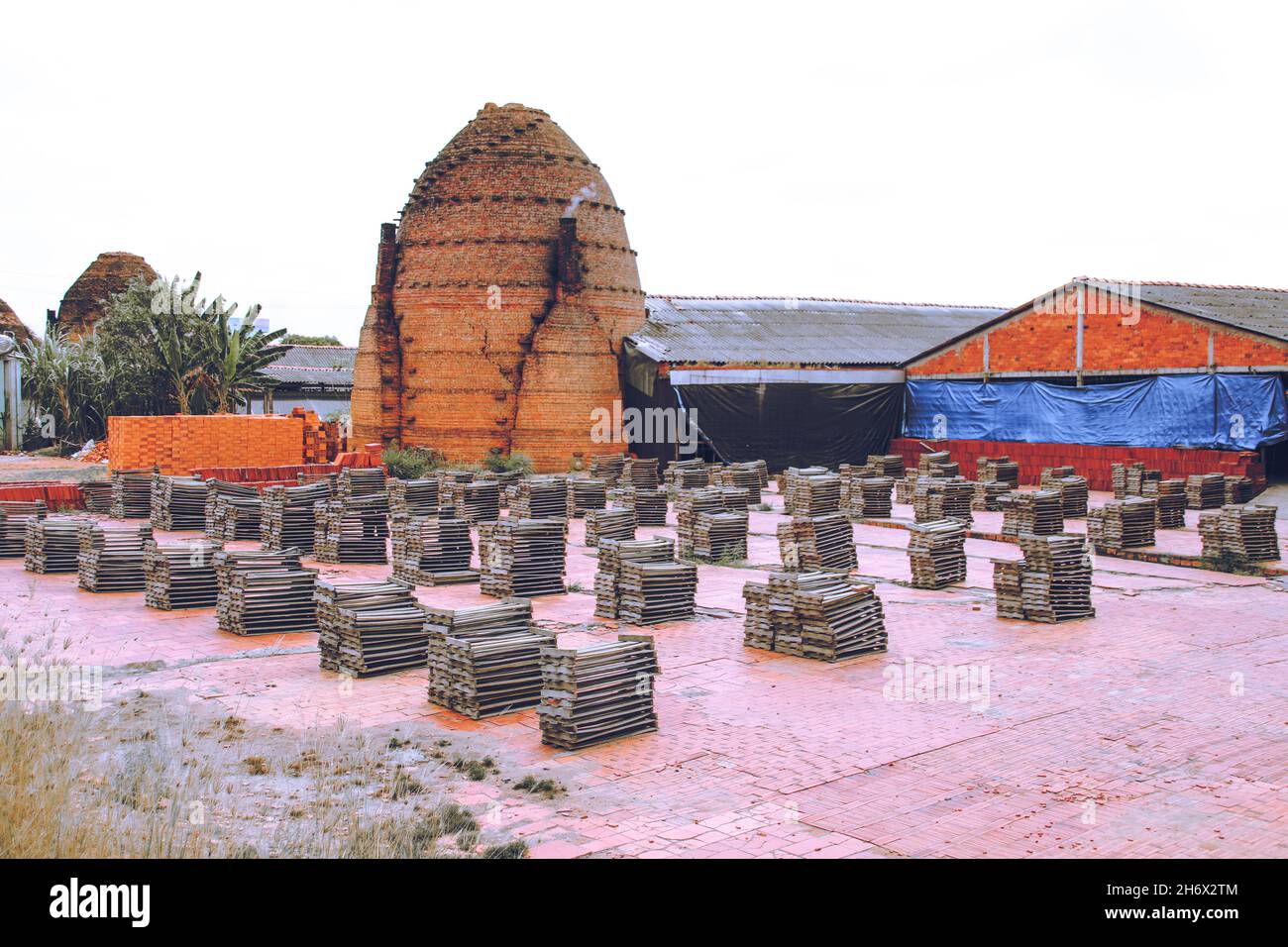 The famous centenarian traditional kilns for manufacturing handmade bricks in Vinh Long Province of Mekong Delta, Vietnam Stock Photo