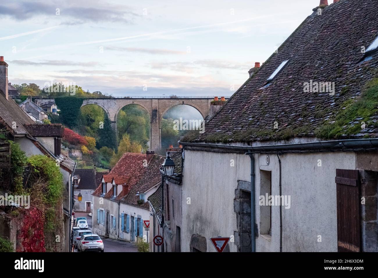 A rail viaduct viewed from Rue de l'Abreuvoir in Semur-en-Auxois, Cote d'Or, France Stock Photo