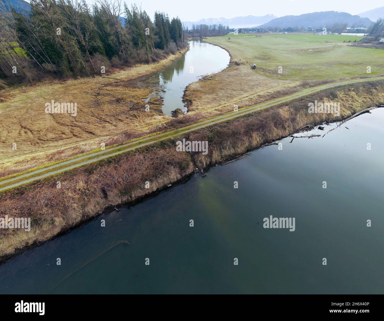 Old flood gate in a flood dyke  in the Sumas prairie farmland Stock Photo