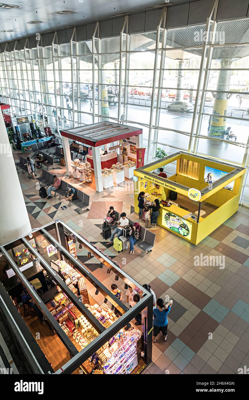 Food and mobile phone kiosks at airport, Miri, Malaysia Stock Photo