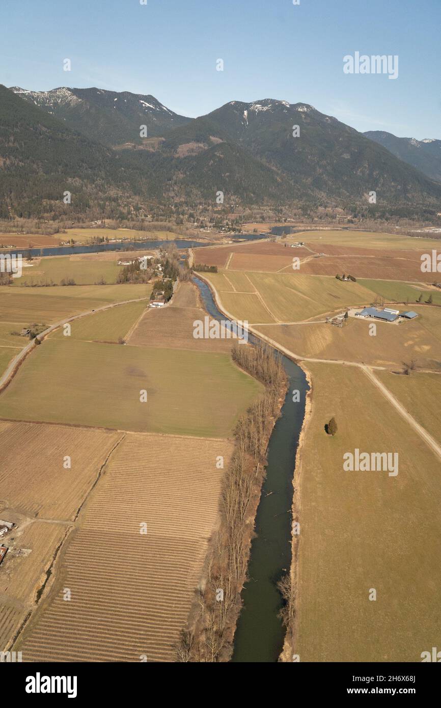 Bird-eye view of a flood dyke in the Sumas prairie in the Fraser Valley, British Columbia, Canada. Stock Photo