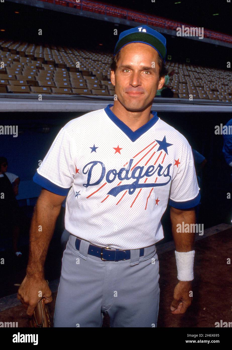 Gregory Harrison at the 32nd Annual 'Hollywood Stars Night' Celebrity Baseball Game on August 18, 1990 at Dodger Stadium in Los Angeles, California Credit: Ralph Dominguez/MediaPunch Stock Photo