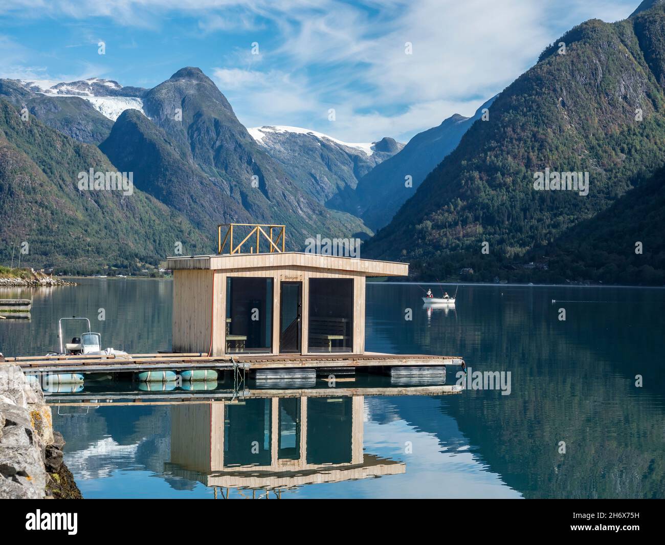 Floating sauna, village Fjaerland at the Sognefjord,  glacier Jostedalsbre in the back, Norway Stock Photo