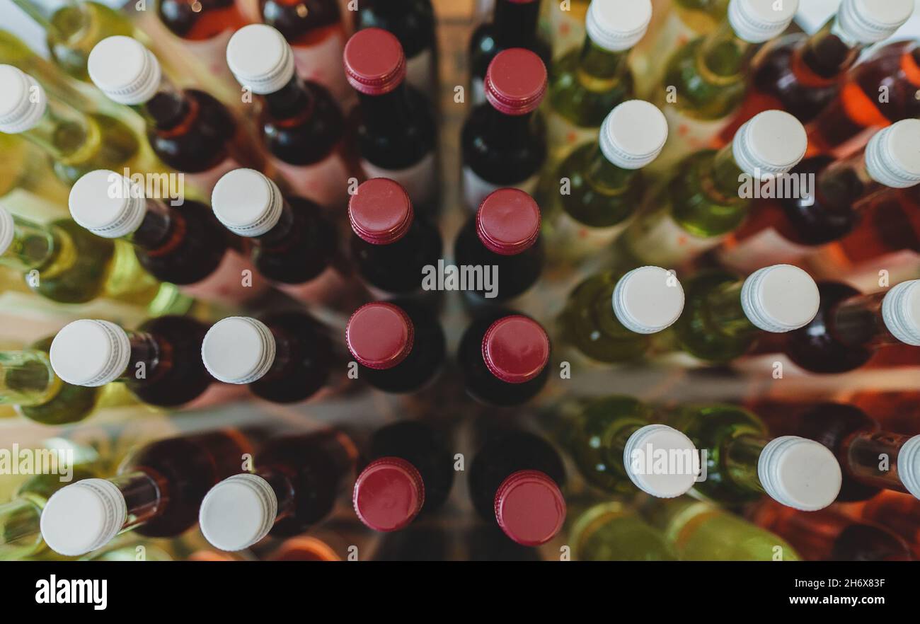 Wine bottles in the wine store. Top view. Stock Photo