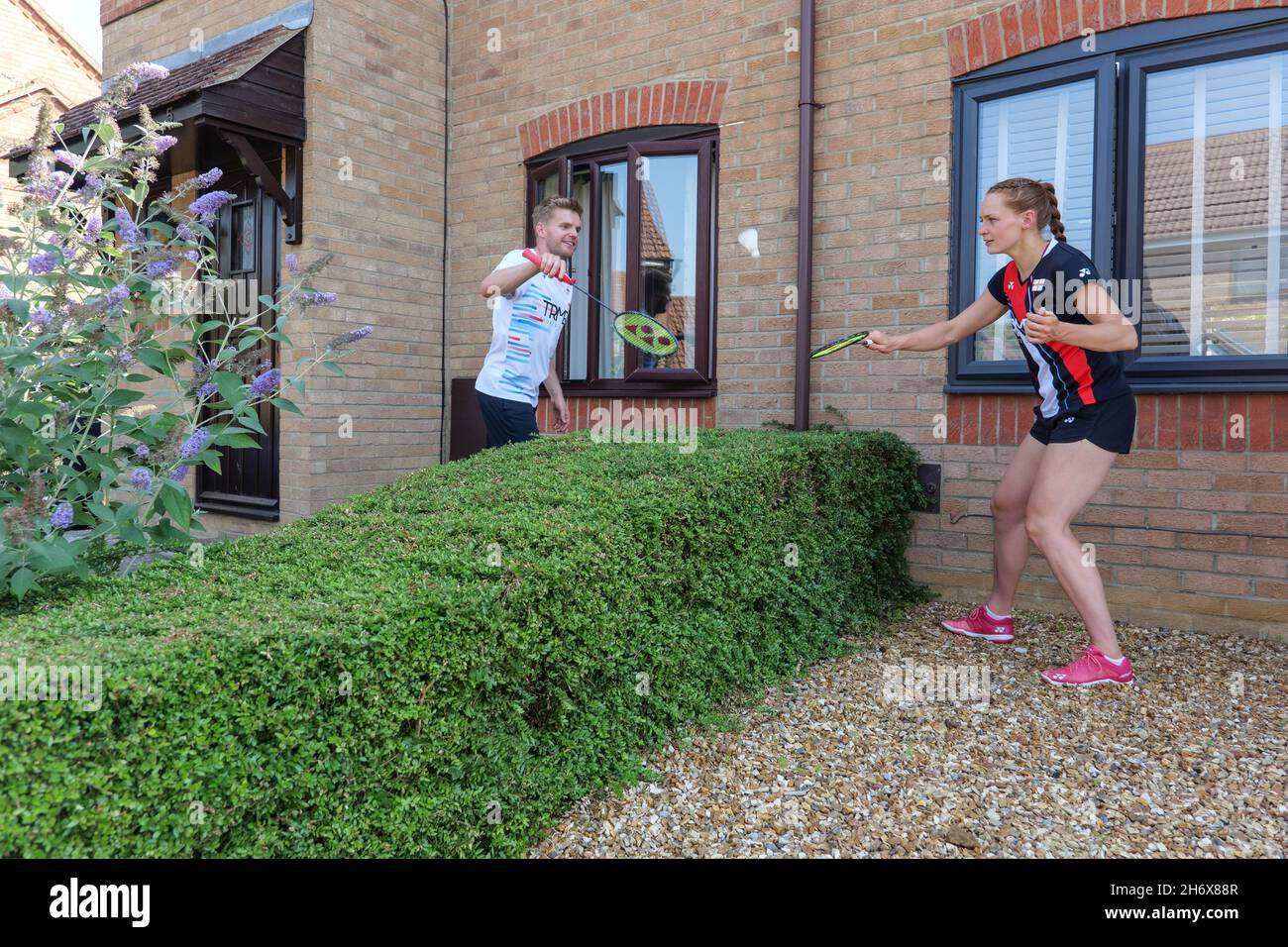 11/06/20 - Badminton England mixed doubles players Marcus Ellis and Lauren Smith playing badminton at home following Covid-19 lockdown. Stock Photo