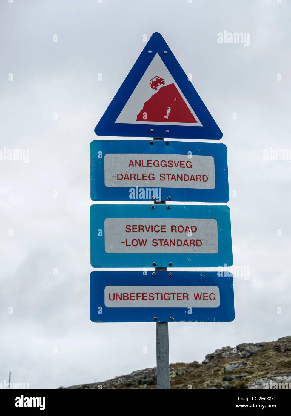 Warning sign, bad quality of a service road, side road of Sognefjell mountain pass, Sognefjell, Norway. Stock Photo