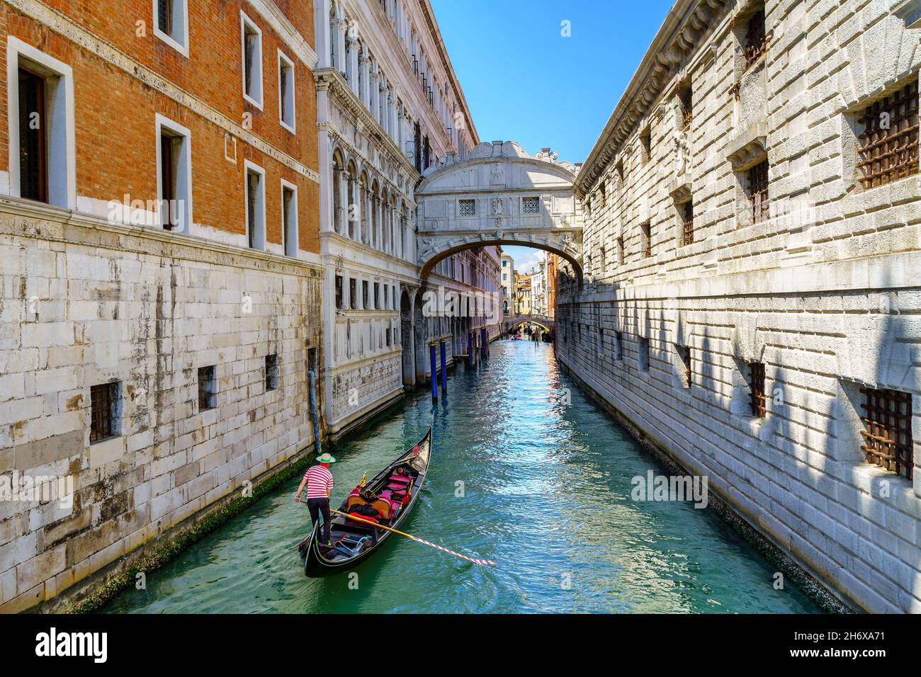 Gondola along a canal in Venice Stock Photo - Alamy