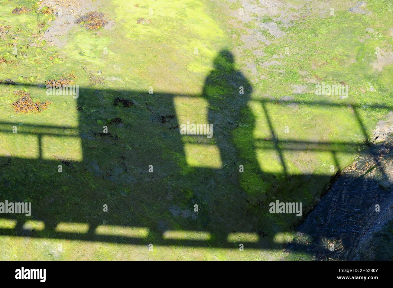 Shadow cast at low tide, Prinsted, West Sussex. Stock Photo