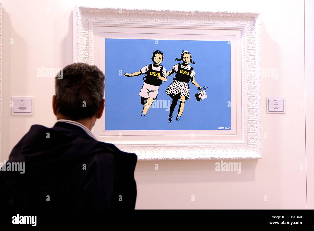 Rome, Italy. 18th Nov, 2021. A visitor observes a work by the artist ...