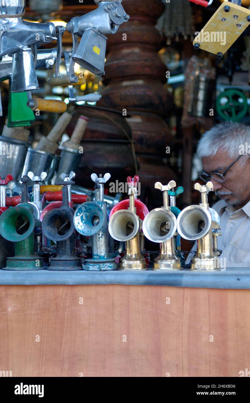Row of cycle horns with shopkeeper, Calcutta, India Stock Photo Alamy