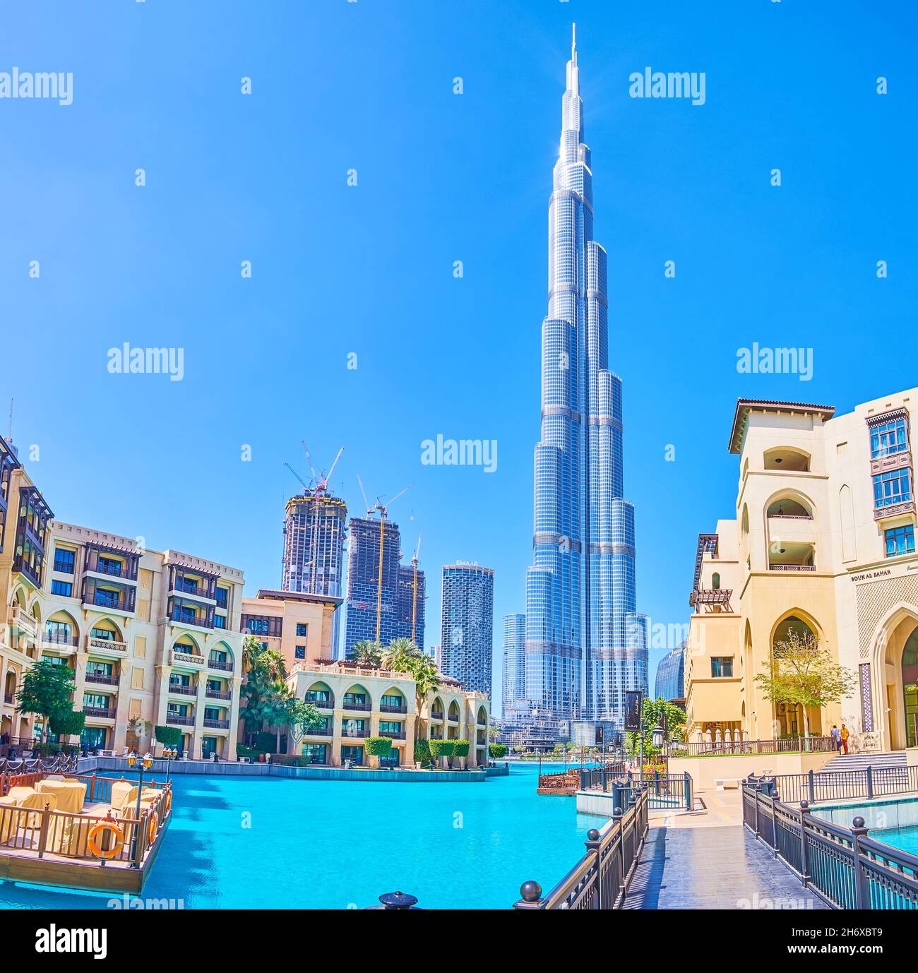 DUBAI, UAE - MARCH 3, 2020: Scenic vernacular Arabic styled Old Town Island complex and modern Burj Khalifa tower on background, on March 3 in Dubai Stock Photo
