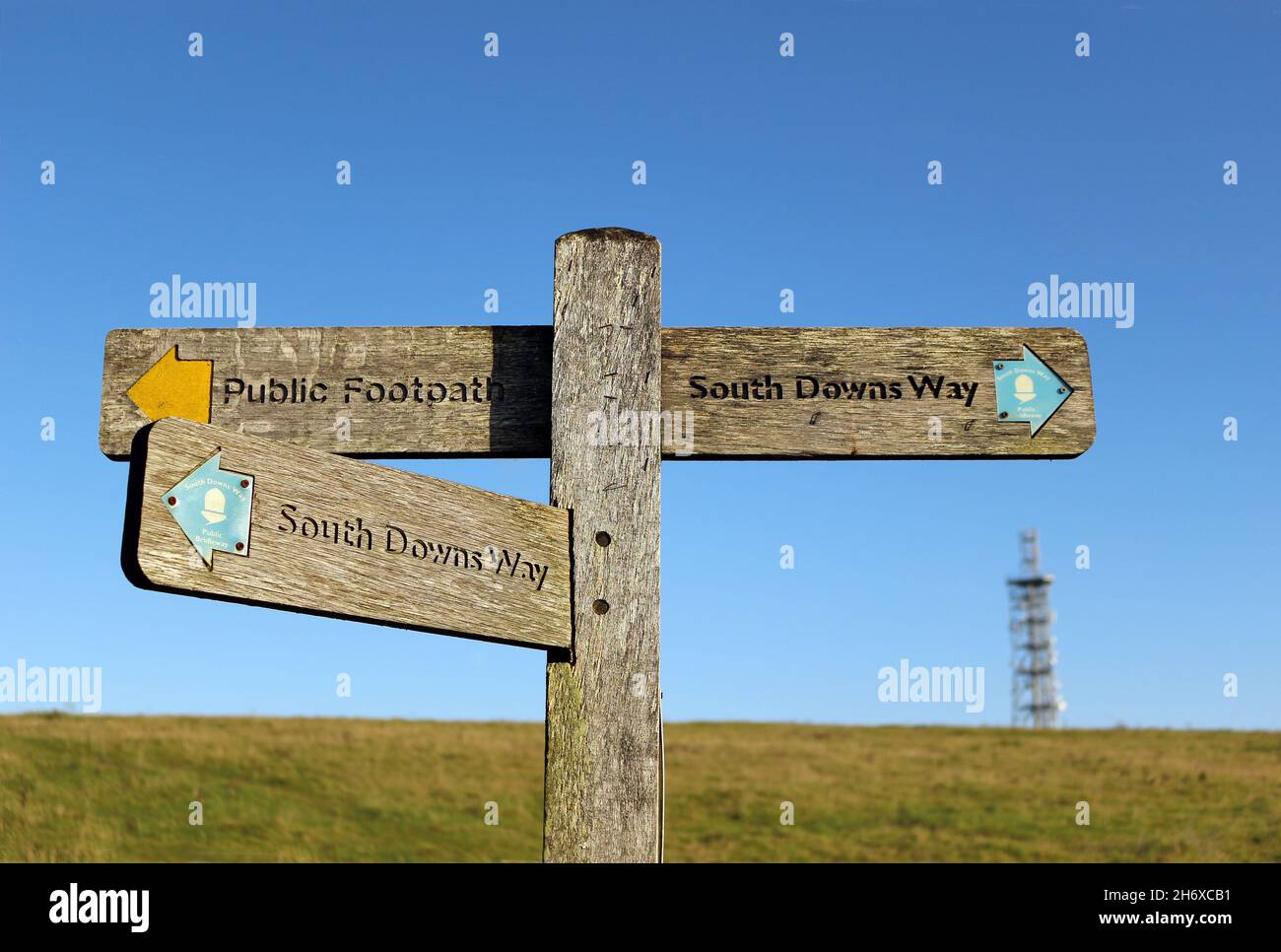 A wooden signpost to the South Downs Way at Butser Hill in Hampshire, England Stock Photo