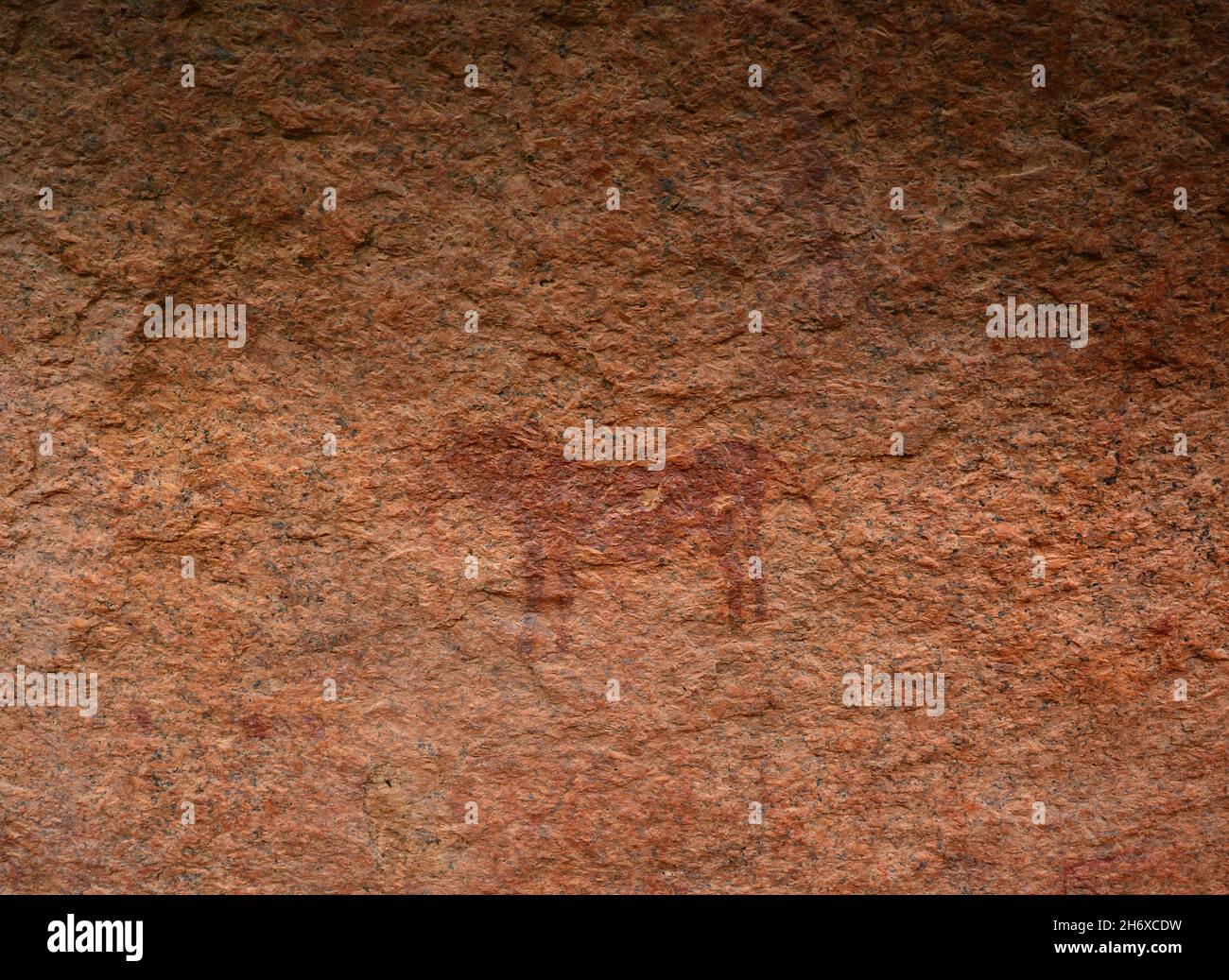 Rock paintings on a granite cave. Little Bushman’s Paradise, Spitzkoppe, Namibia Stock Photo