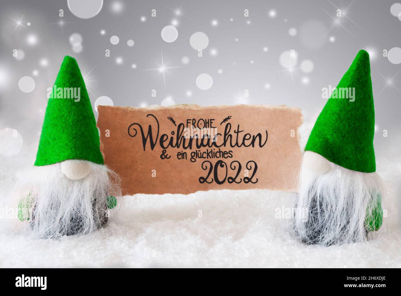 Santa Claus, Green Hat, Glueckliches 2022 Means Happy 2022, Gray Background Stock Photo