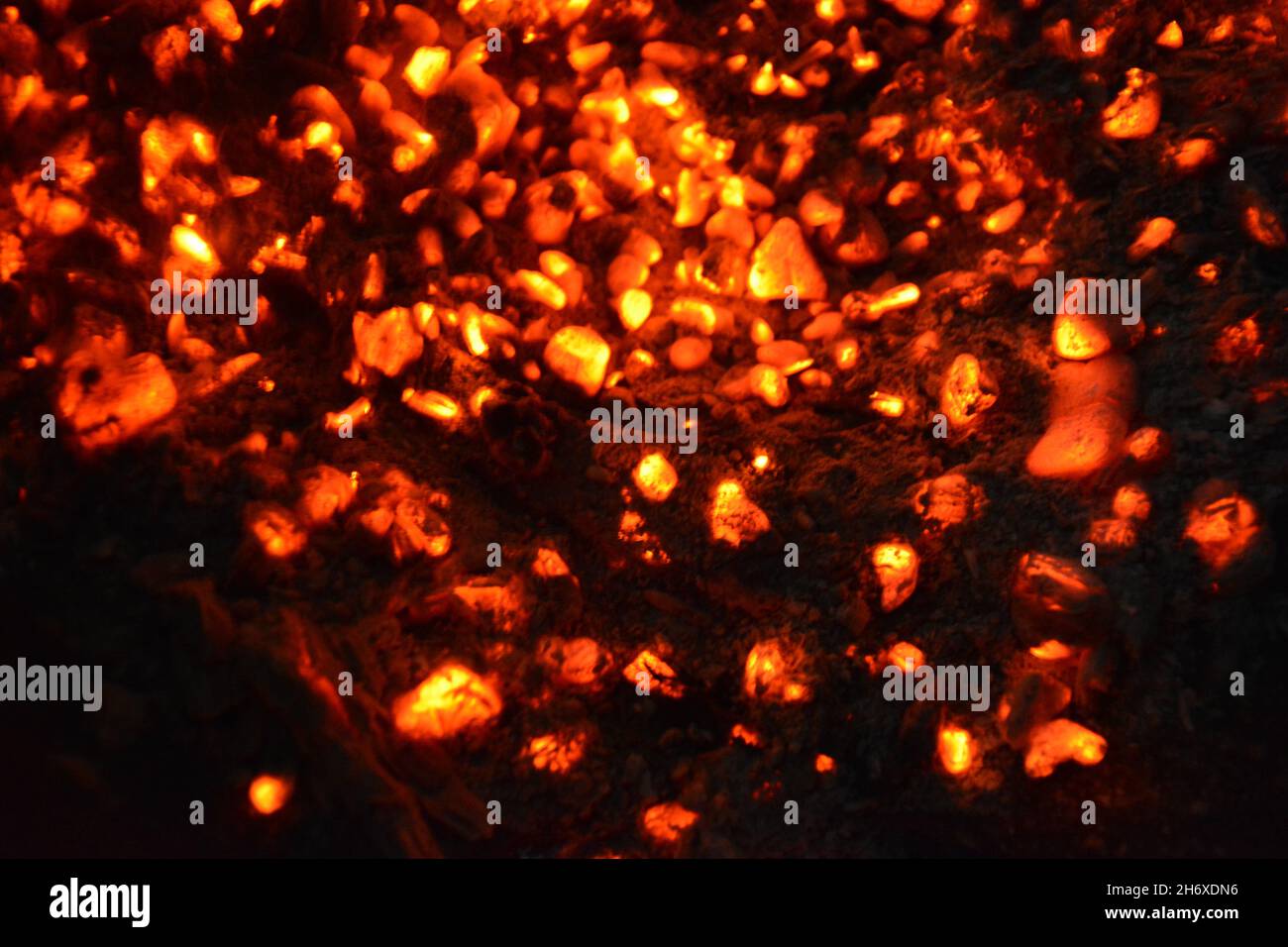 Hot coals from a fire Stock Photo