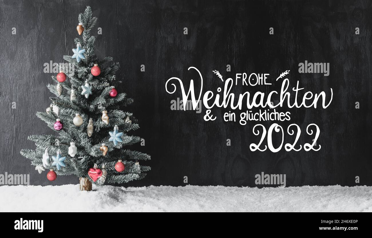 Christmas Tree, Snow, Colorful Ball, Glueckliches 2022 Means Happy 2022 Stock Photo