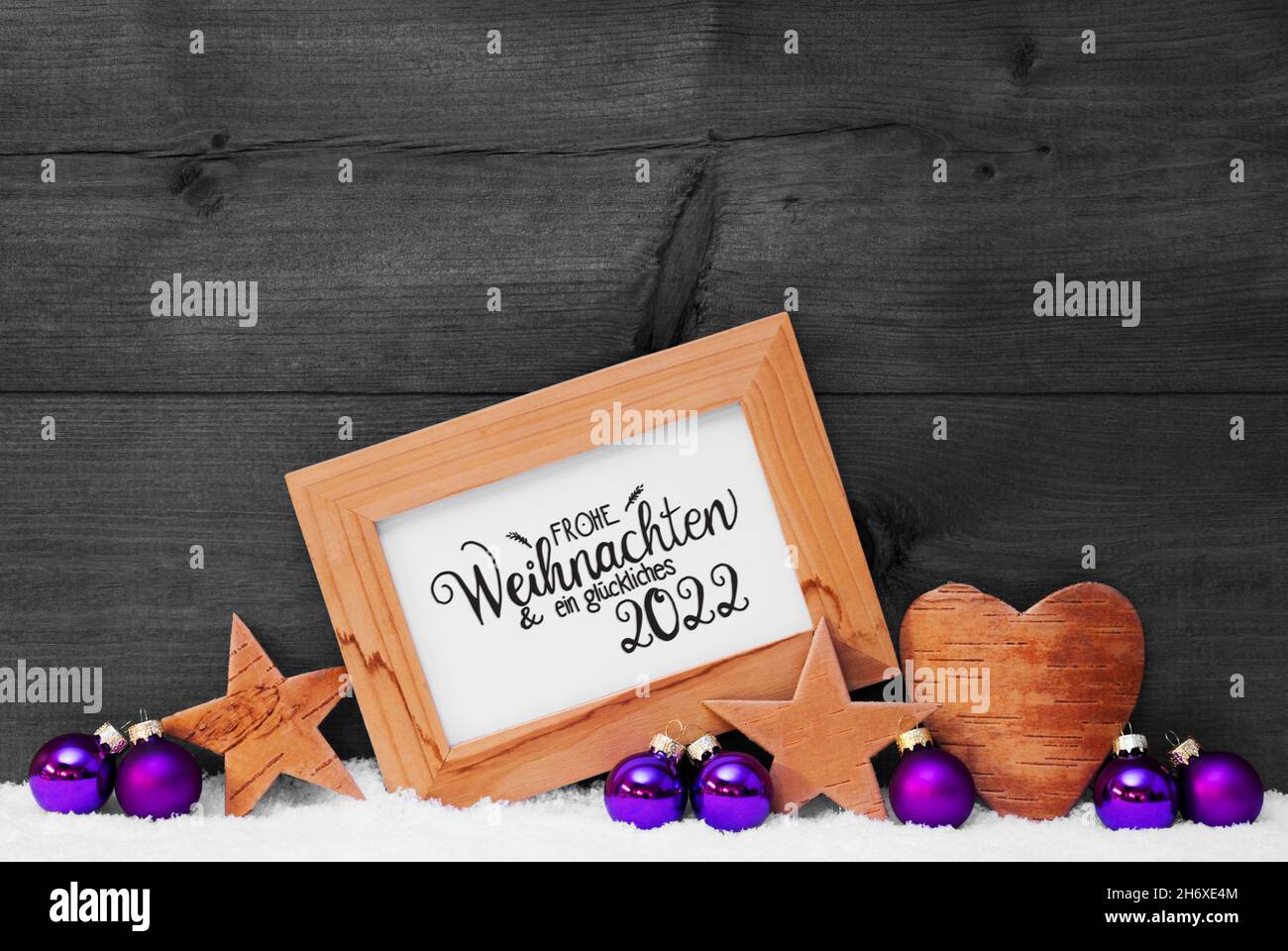 Frame, Purple Ball, Snow, Glueckliches 2022 Means Happy 2022, Gray Background Stock Photo