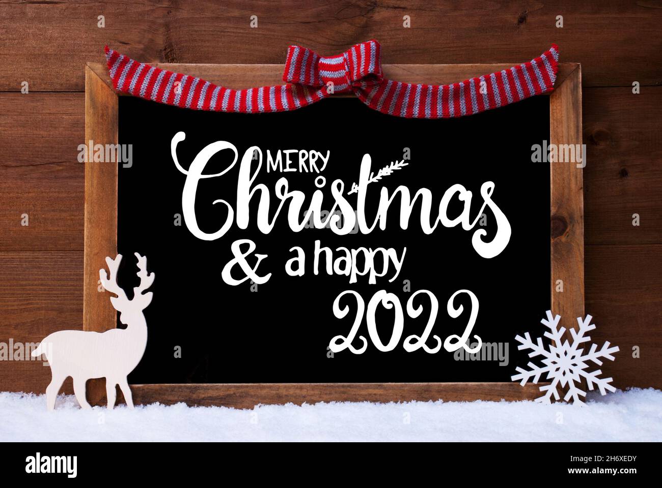 Chalkboard, Christmas Decoration, Snow, Deer, Merry Christmas And A Happy 2022 Stock Photo