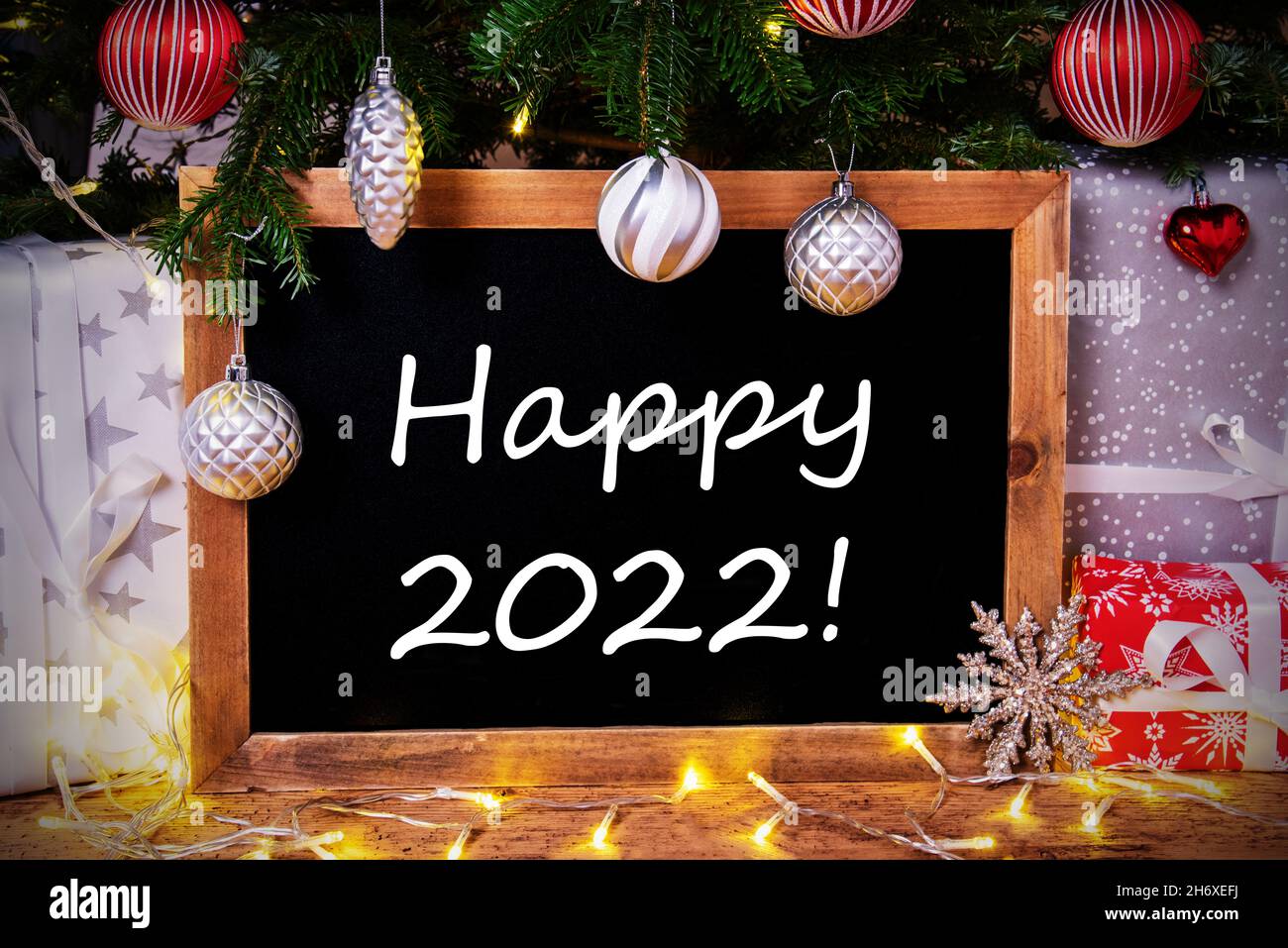 Burwell Christmas Tree Lighting 2022 Chalkboard, Tree, Gift, Fairy Lights, Text Happy 2022 Stock Photo - Alamy