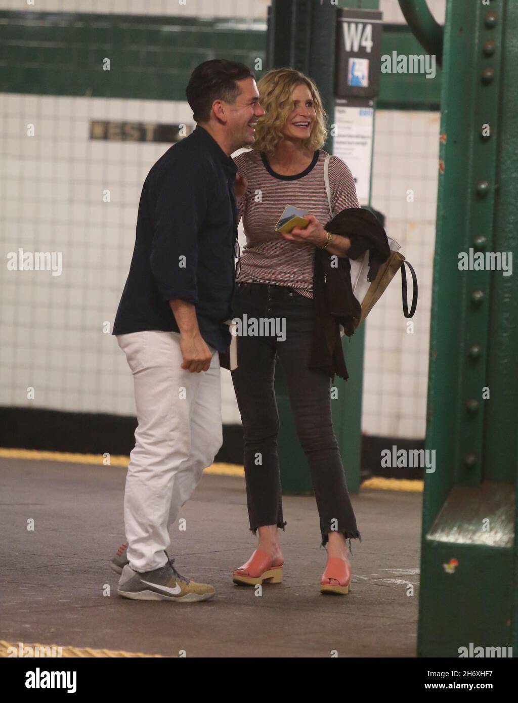 New York NY 07/24/2019 Kyra Sedgwick waiting for a subway with a