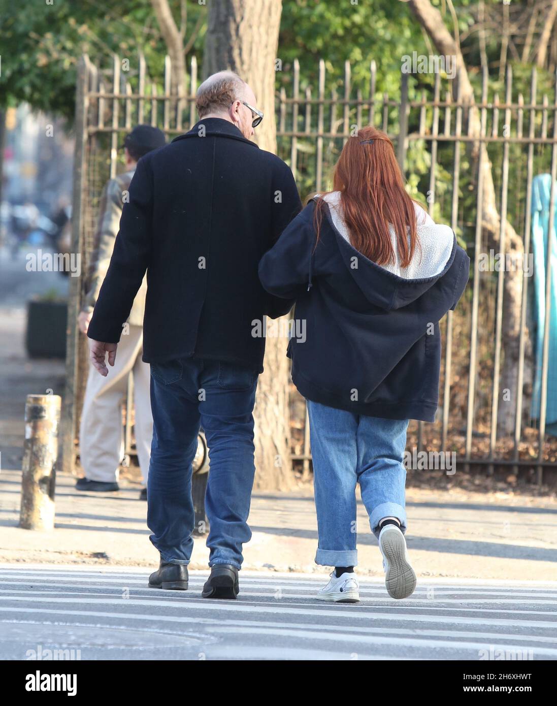 New York - NY - 12/23/2019- Louis C.K. and daughter Mary Louise Szekely (14  years old) joking around with each other and sharing headphones in Soho  -PICTURED: Louis C.K.Mary Louise Szekely Stock Photo - Alamy