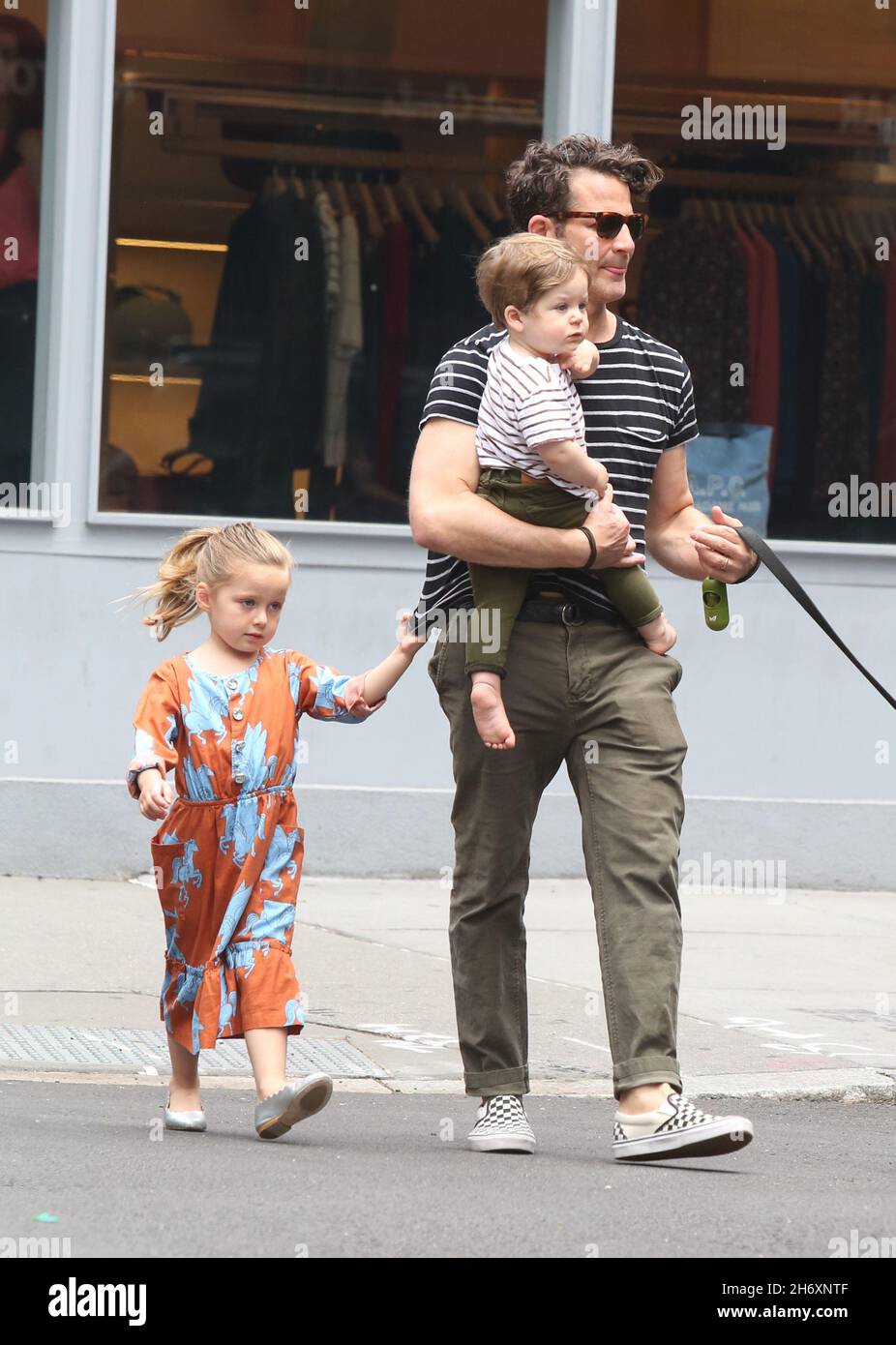 New York NY 06/16/2019 Nate Berkuswalking his dog with daughter