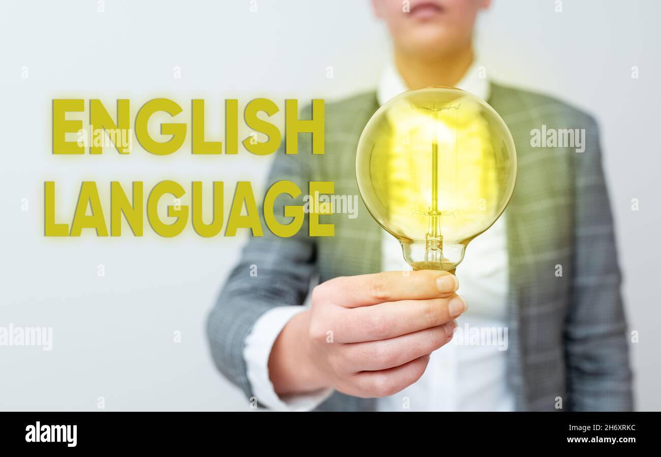 Sign displaying English Language. Conceptual photo third spoken native lang in world after Chinese and Spanish Lady in business outfit holding lamp Stock Photo