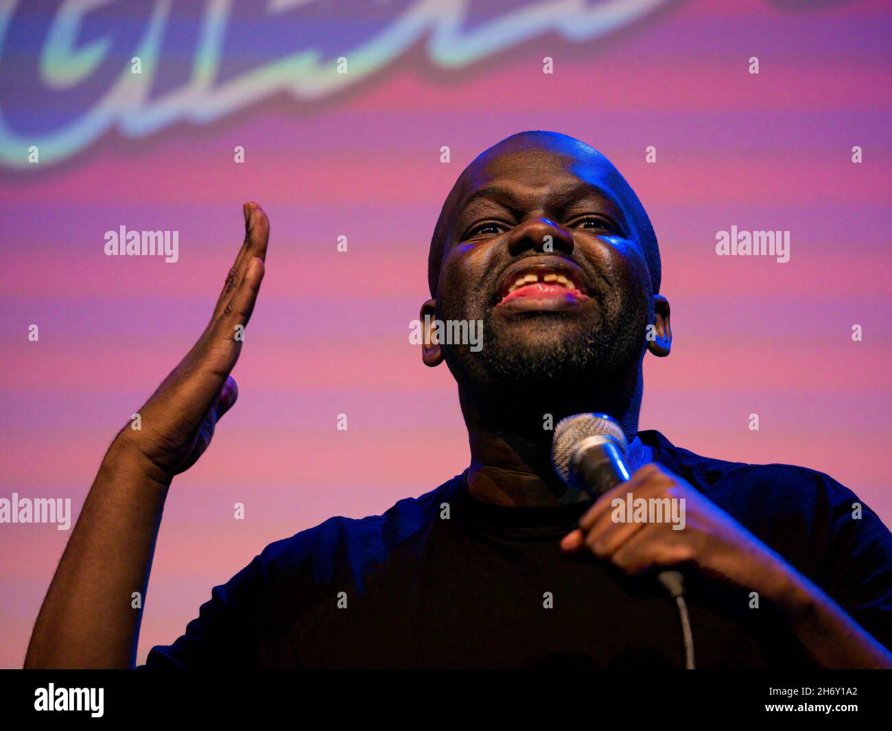 Black Malawian comedian Daliso Chaponda on stage at Gilded Balloon, Edinburgh Festival Fringe, Scotland, UK Stock Photo