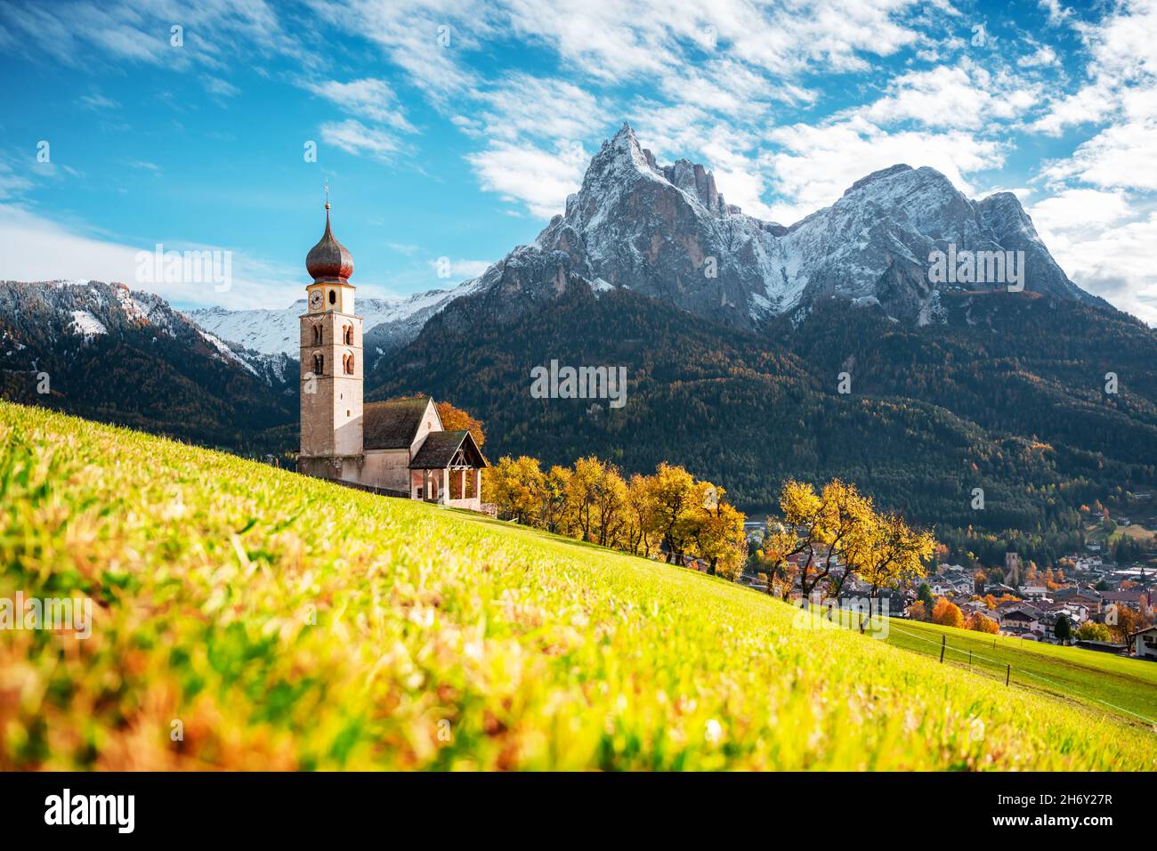 St. Valentin (Kastelruth) Village Church at the autumn Dolomite Alps