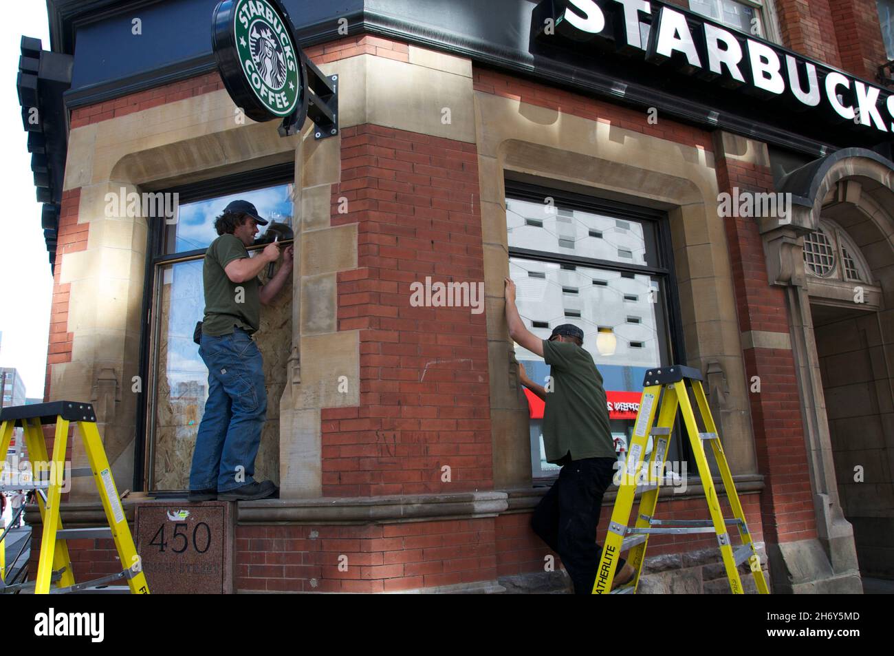 Toronto, Ontario, Canada - 06/25/2010: Window was smashed in coffee shop during G20 protests Stock Photo