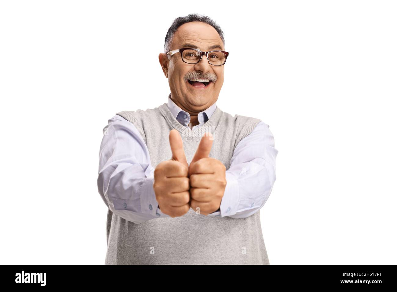 Excited mature man showing both thumbs up isolated on white background Stock Photo