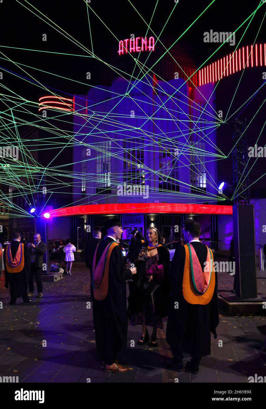 Leicester, Leicestershire, UK. 18th November, 2021. Graduates stand under the Rhizome Light Installation during the Christmas lights with on event.  Credit Darren Staples/Alamy Live News. Stock Photo