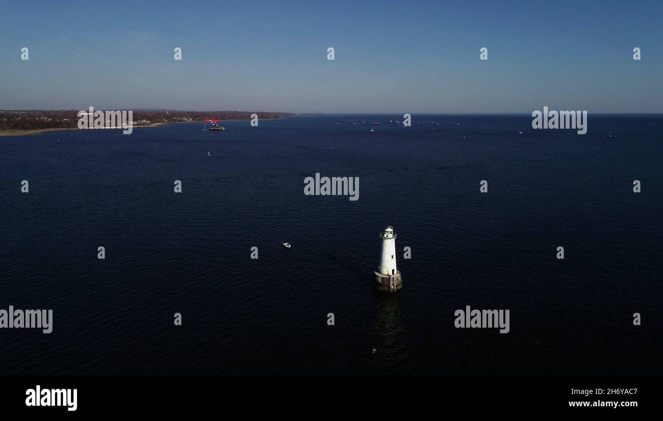 Aerial view of Raritan Bay with the Great Beds Lighthouse in South