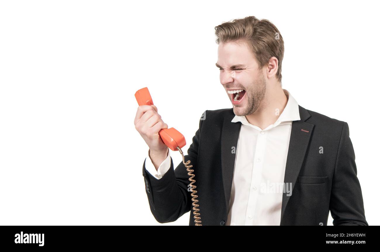 Bad line. Angry manager scream holding telephone receiver. Screaming guy use vintage telephone Stock Photo