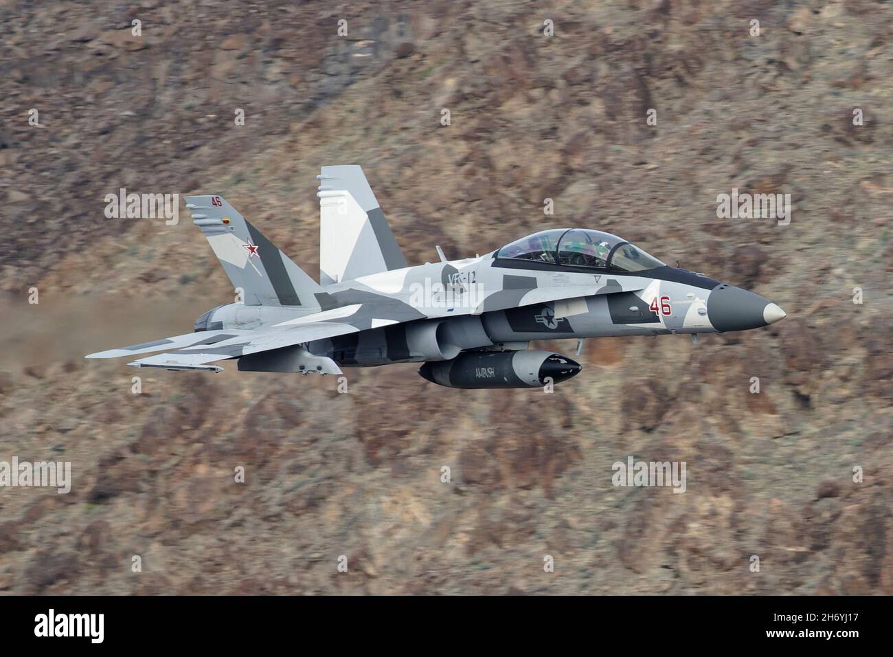 Boeing F/A-18D Hornet flown by US Navy squadron VFC-12 'Fighting Omars' from NAS Oceana Flying through Death Valley during 2019 Stock Photo
